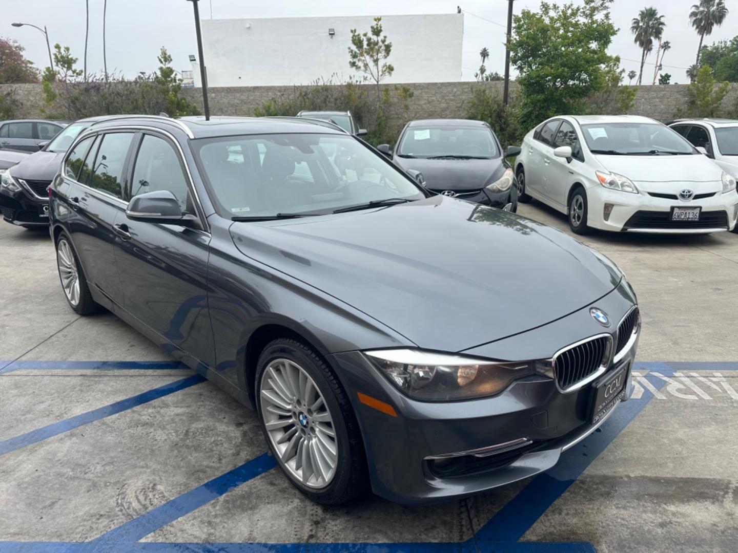 2014 Grey /Black BMW 3-Series Sport Wagon Leather (WBA3K5C53EK) with an 2.0 engine, Automatic transmission, located at 30 S. Berkeley Avenue, Pasadena, CA, 91107, (626) 248-7567, 34.145447, -118.109398 - Diesel!! MPG!! X-Drive!! - Photo#24